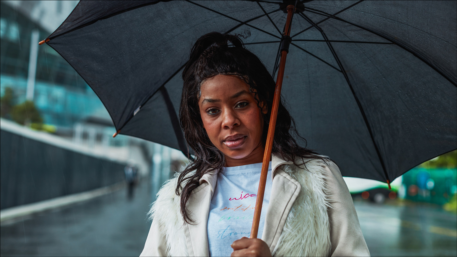 woman holding umbrella
