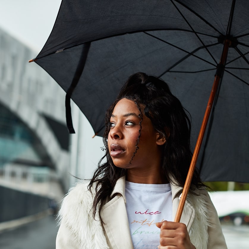 women holding a umbrella
